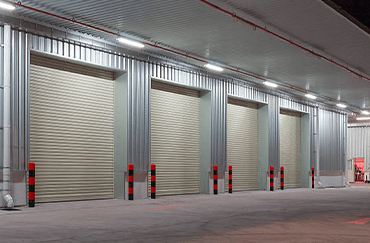 Large Commercial roll-up doors on commercial building